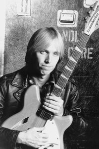 Tom Petty Holding Guitar